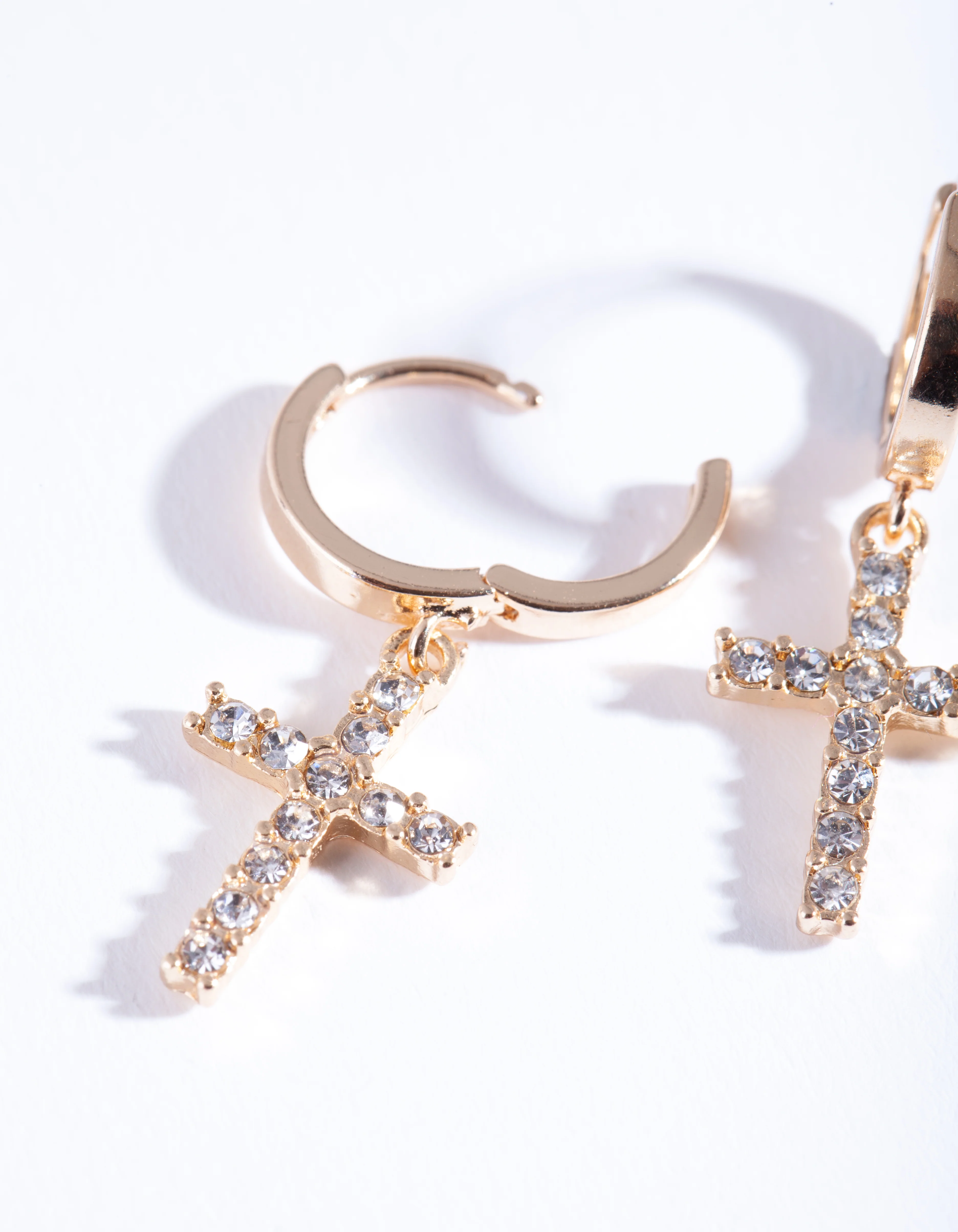 Gold Diamante Cross Huggie Earrings - Image 2