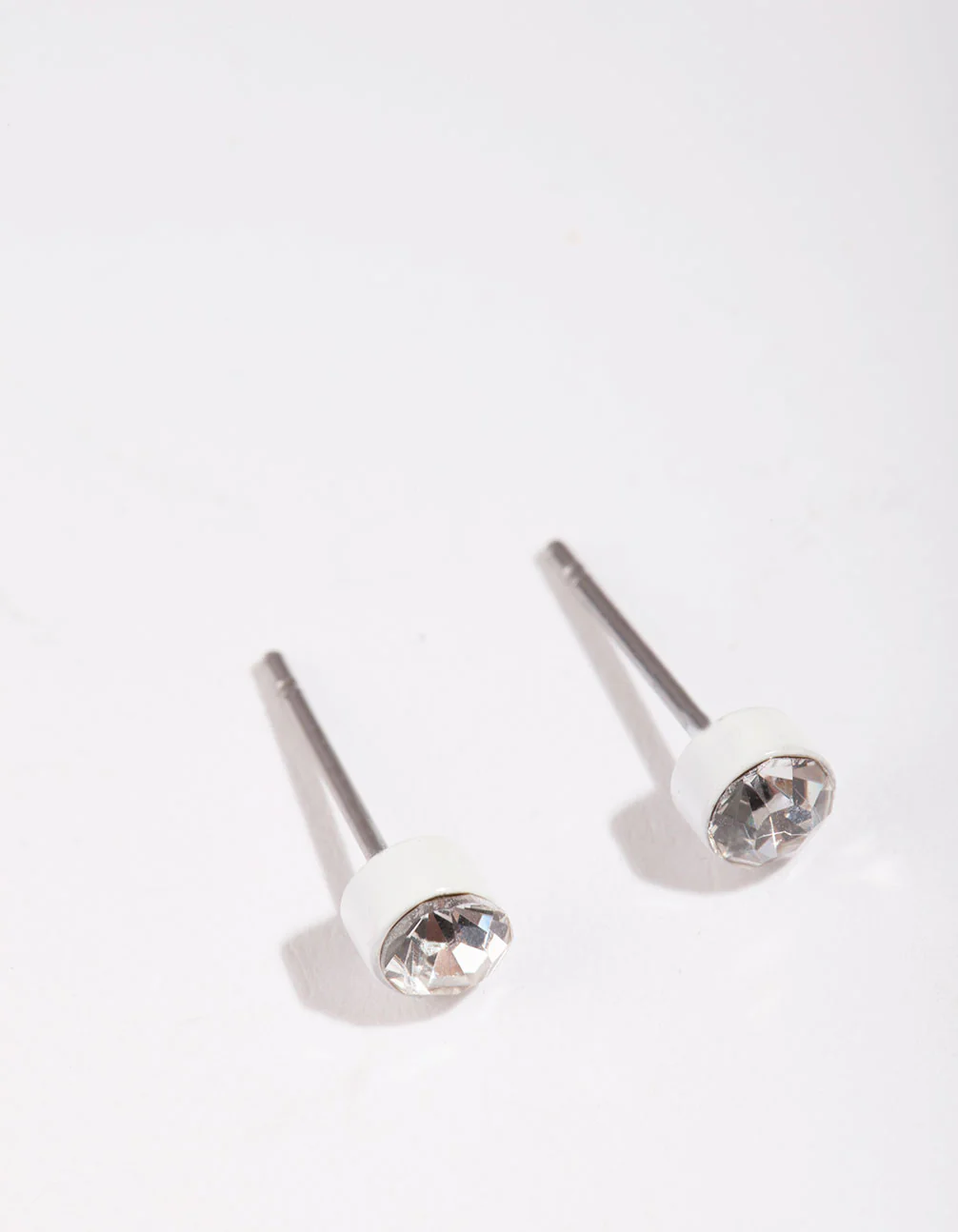 White Diamtante Bezel Stud Earrings - Image 2