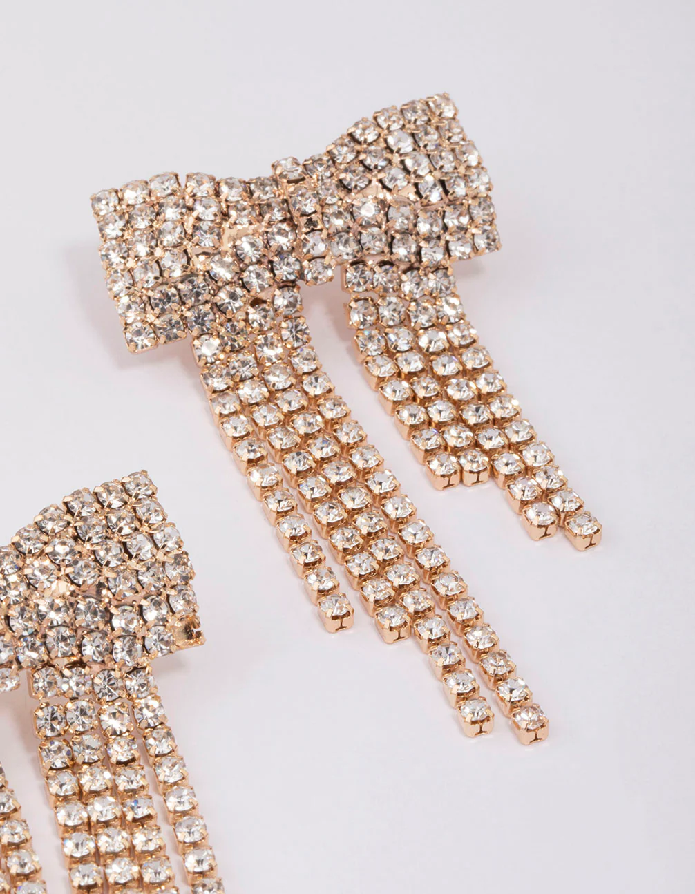 Gold Dazzling Bow Drop Earrings - Image 3