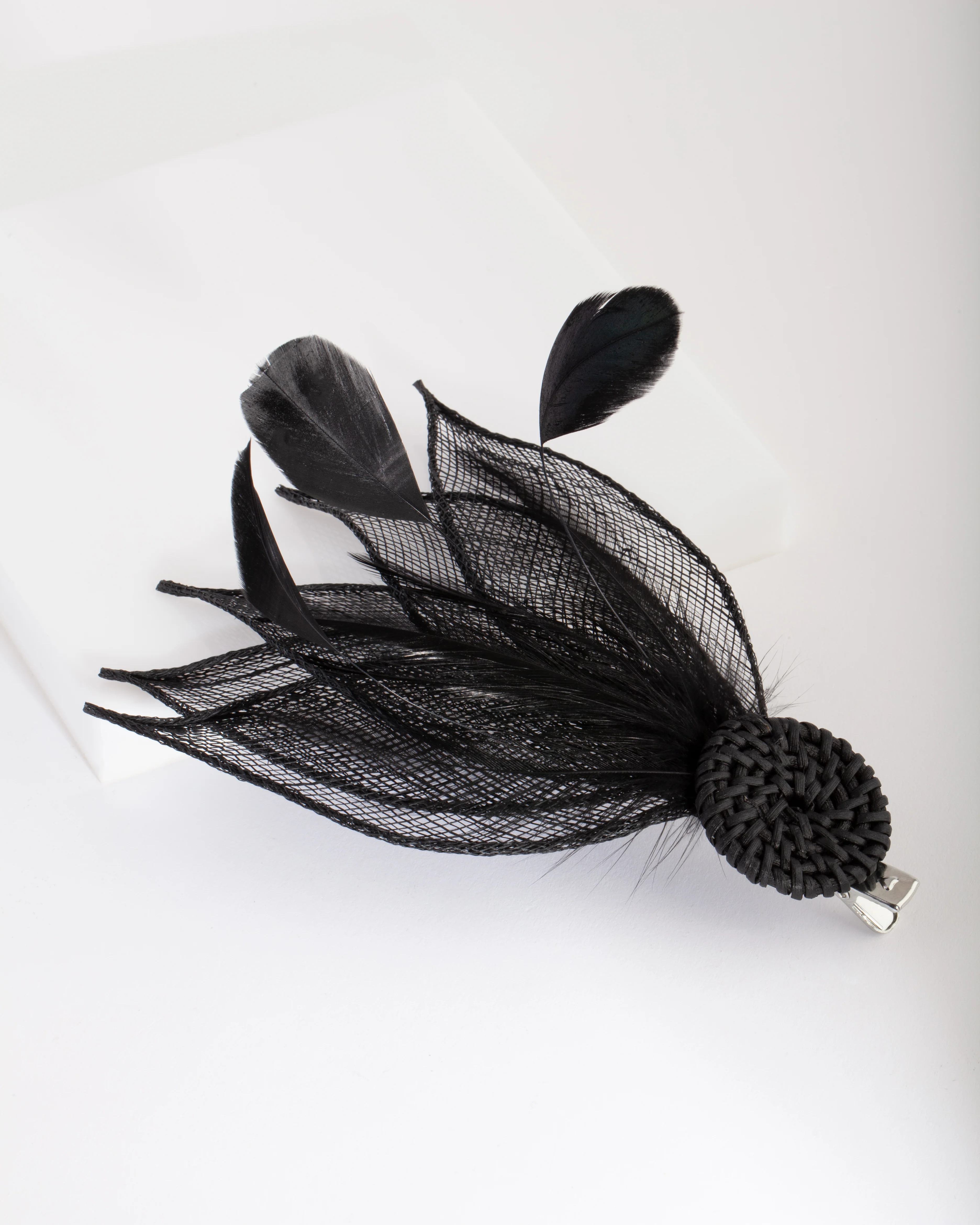 OCHR BLK SINA FTHR PLAIT CLIP