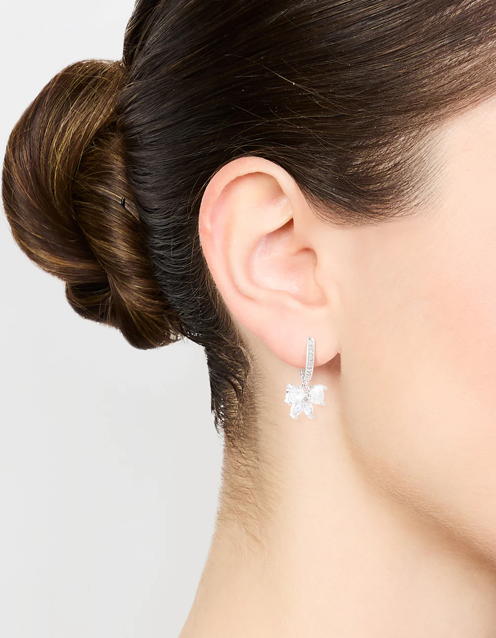 Silver Cubic Zirconia Butterfly Huggie Earrings - Image 2