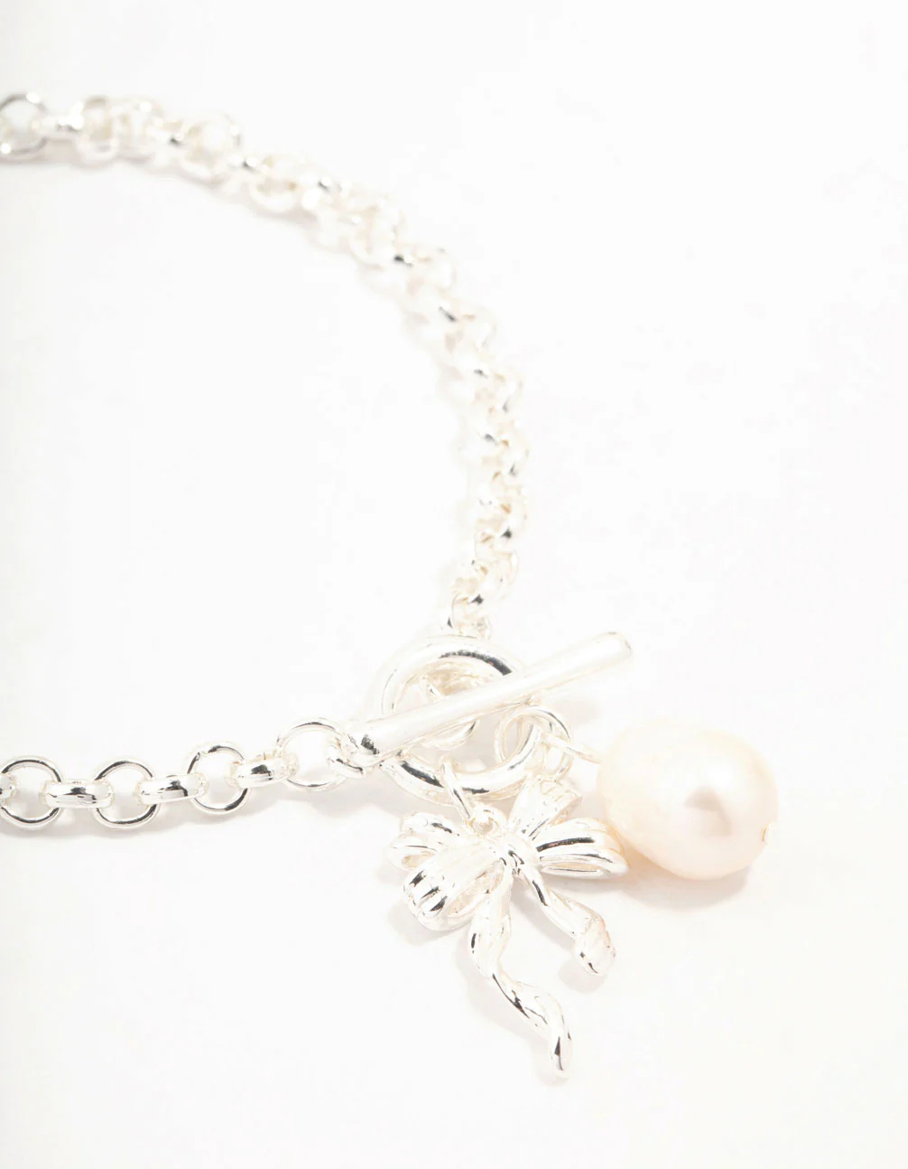 Silver Plated T & O Freshwater Pearl & Bow Charm Bracelet - Image 2