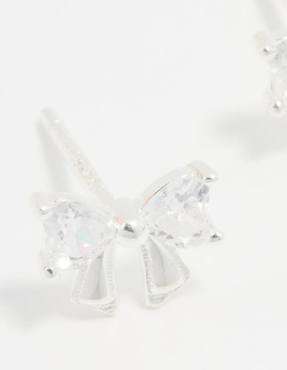 Sterling Silver Cubic Zirconia Clean Bow Stud Earrings - Image 4